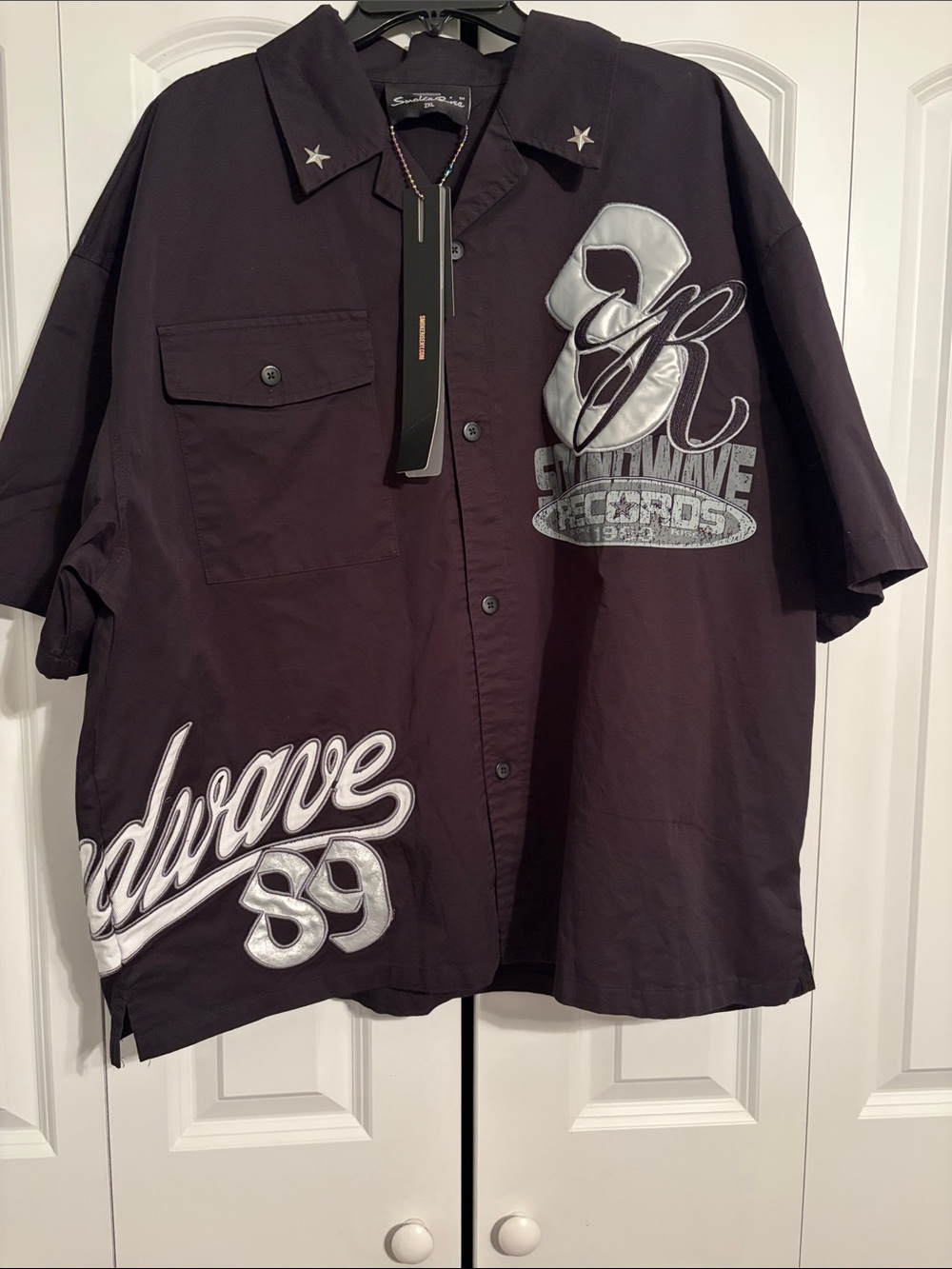 Men's Black Short-Sleeve Button-Down Shirt with Silver Appliqué
